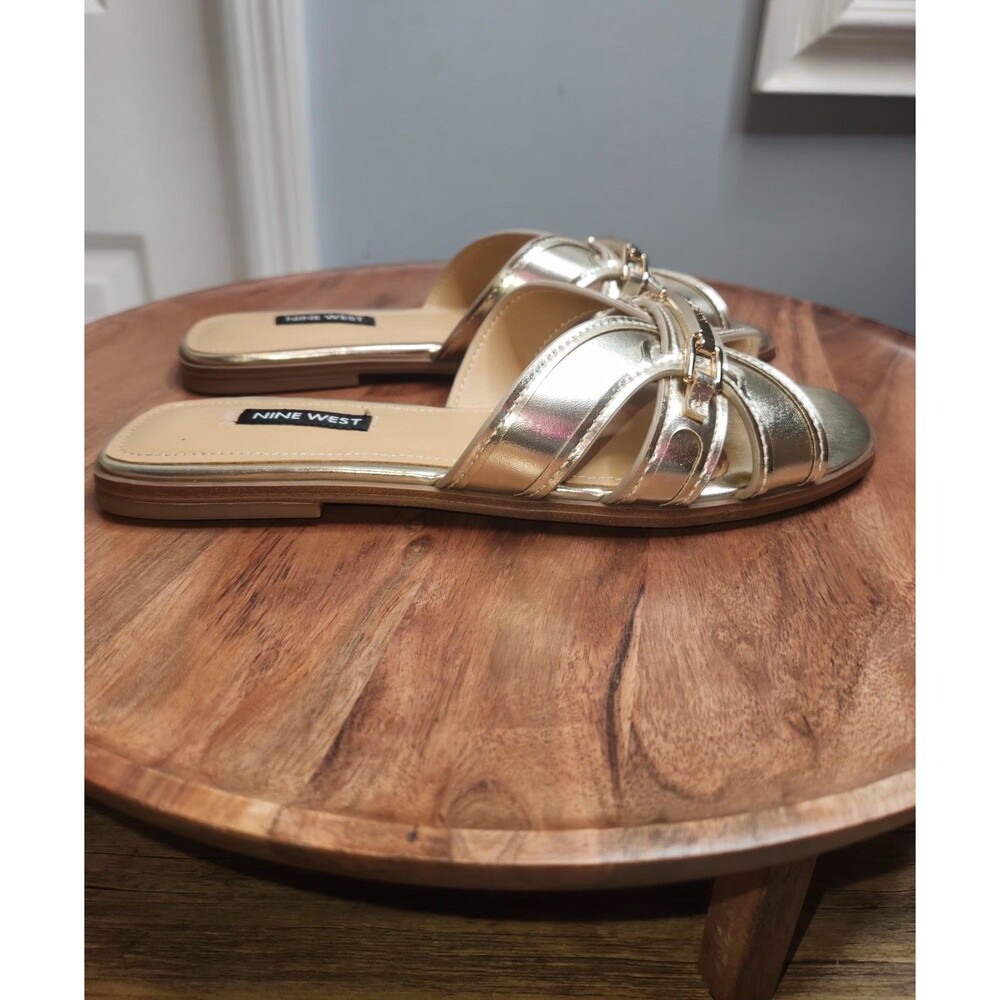 Nine West Women's Gabie Flat Sandals metallic gold finish. US Sz 7.5 Medium